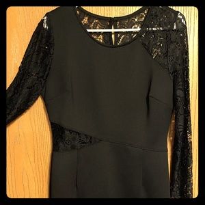 Long lace sleeved, cutout black knee length dress